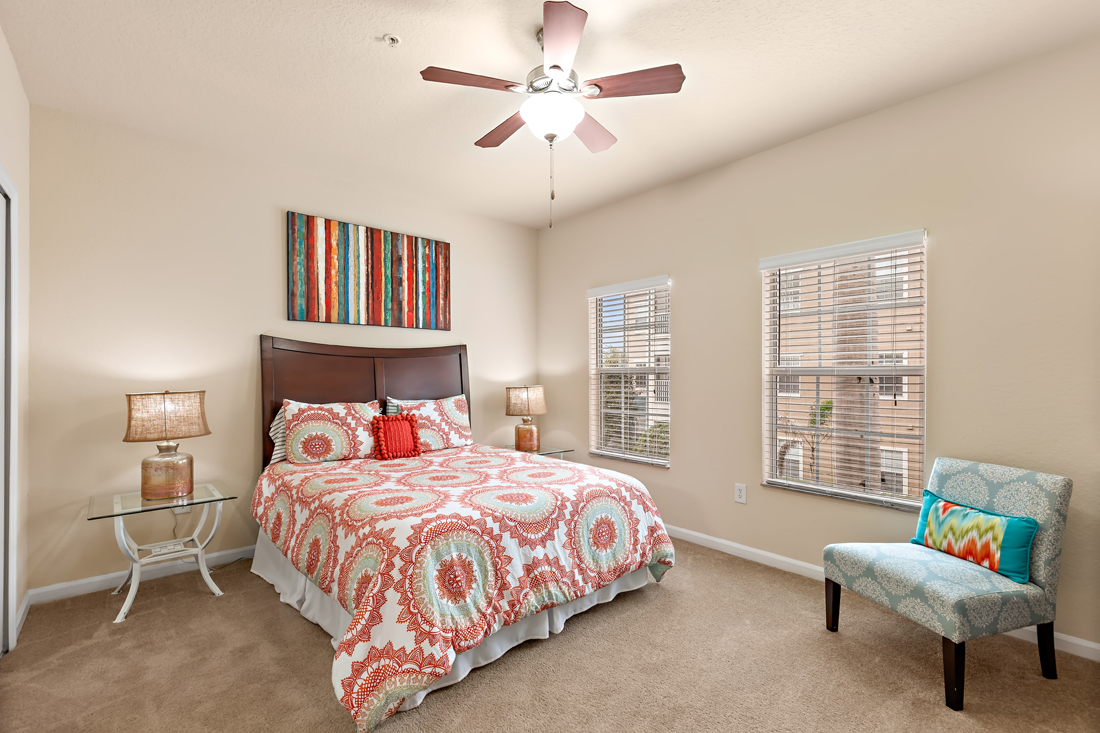 model bedroom with modern furniture and ceiling fan